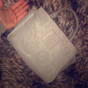 Limited edition Alice in Wonderland purse